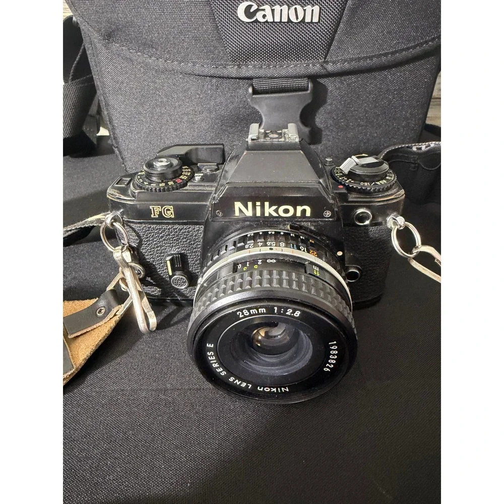 Nikon FG 35mm SLR Camera 28mm f2.8 Lens Disney Mickey Strap Canon Bag Bundle